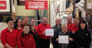 The staff and owner, Gary MacLean of Home Hardware, Grand Bend are pictured with St. Joseph and Area Historical Society representatives, Martha Mungar and Mark Tucker. 